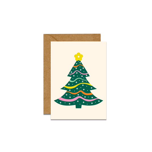 christmas tree with flowers greeting card with brown envelope