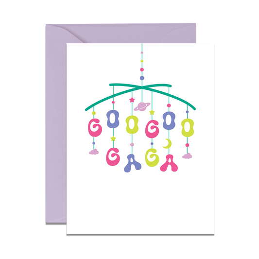 greeting card with baby mobile with space objects and goo goo gaga letters