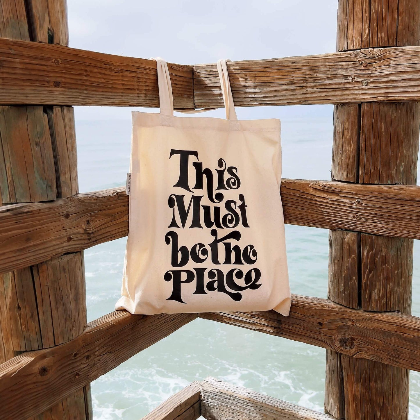 this must be the place tote bag on beach pier