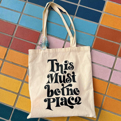 this must be the place tote bag on rainbow tile floor